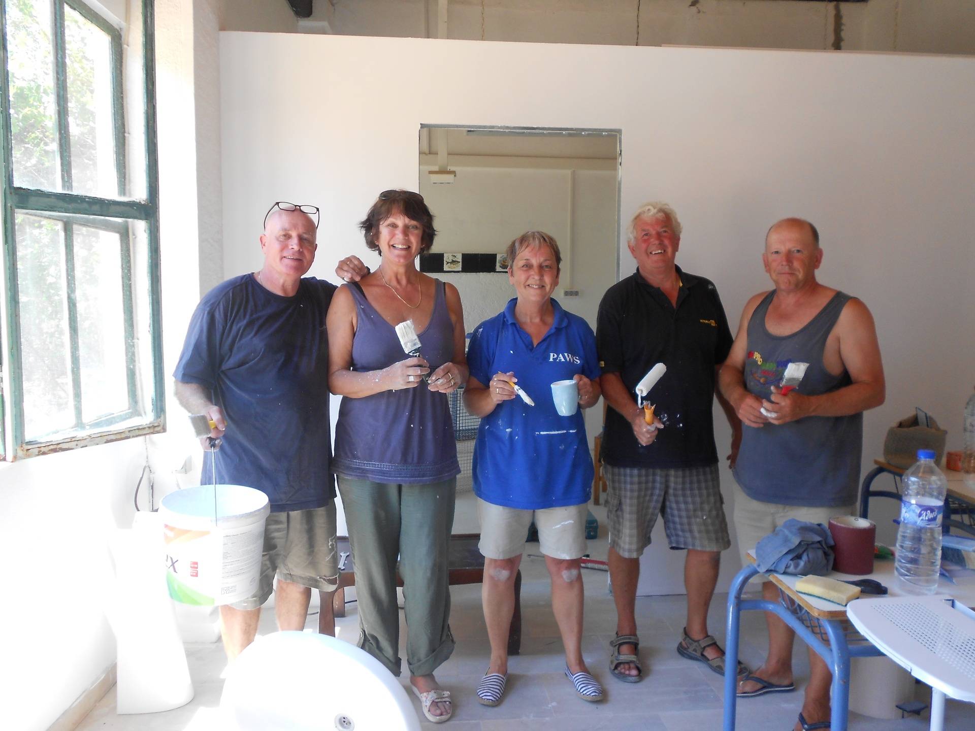 The volunteer painting team