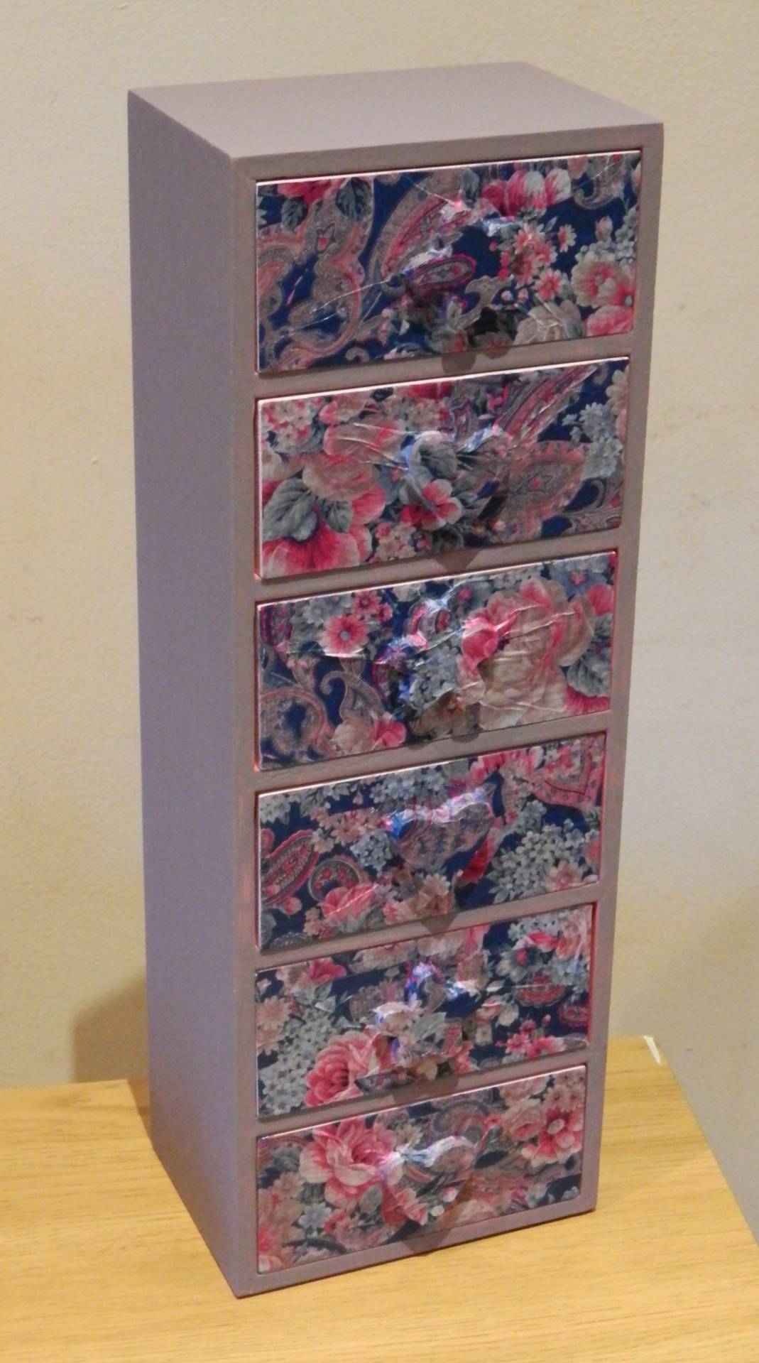 Mini decoupaged and painted drawers.