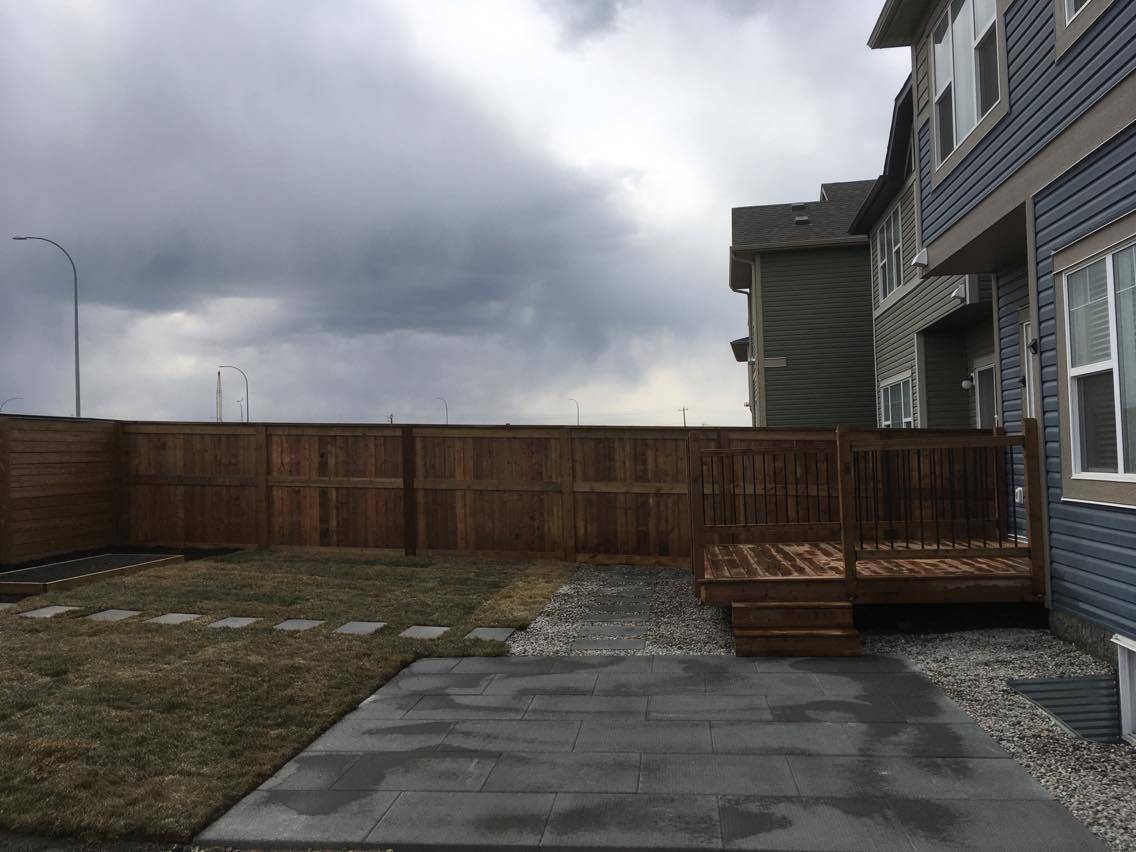 brown pressure treated fence