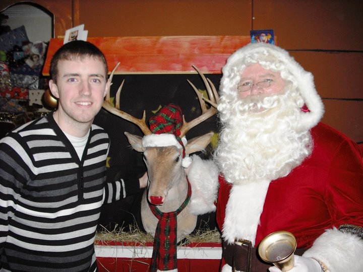 Michael with Santa in the grotto
