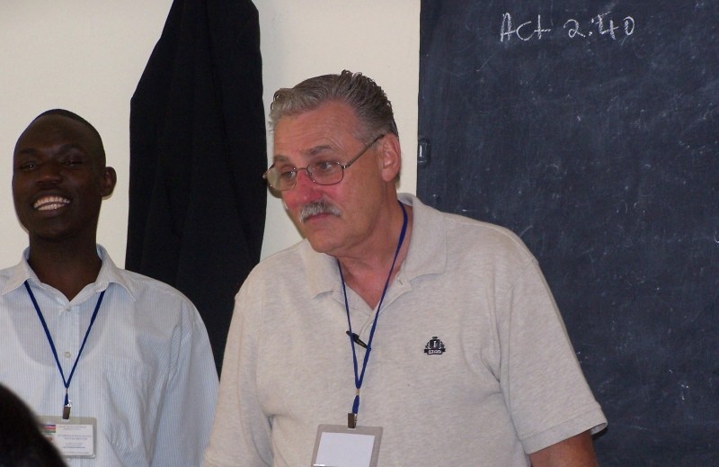 Linus teaching with Pastor Peter