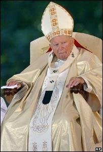 John Paul II in long robe.