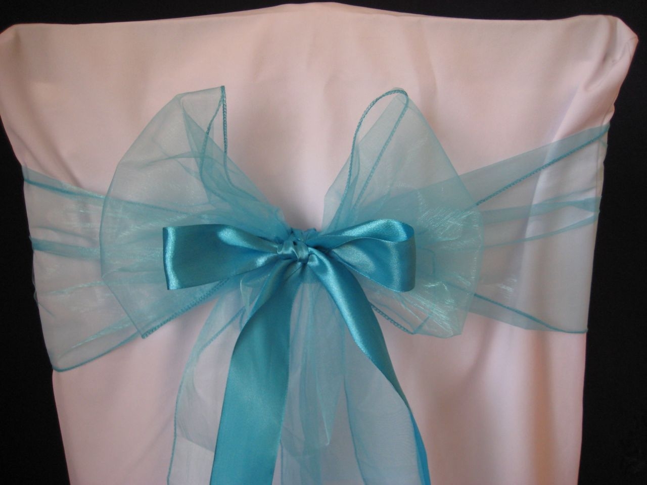 Turquoise blue thin with ribbon.
