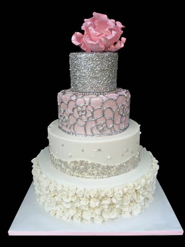 with silver edible sequins and gum paste peony