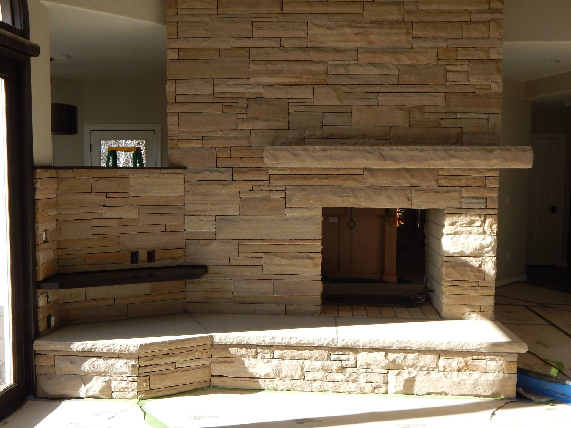 Buff strip stone Fireplace near Boulder Colorado