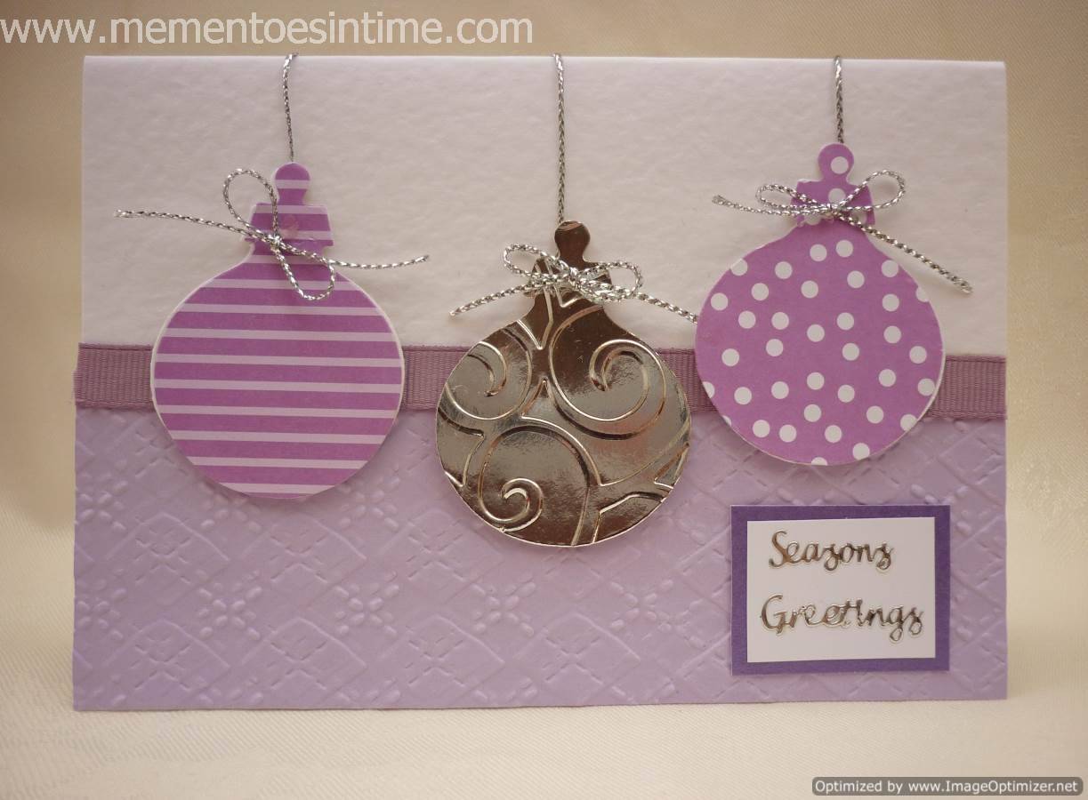 Three ornaments in silver and lilac