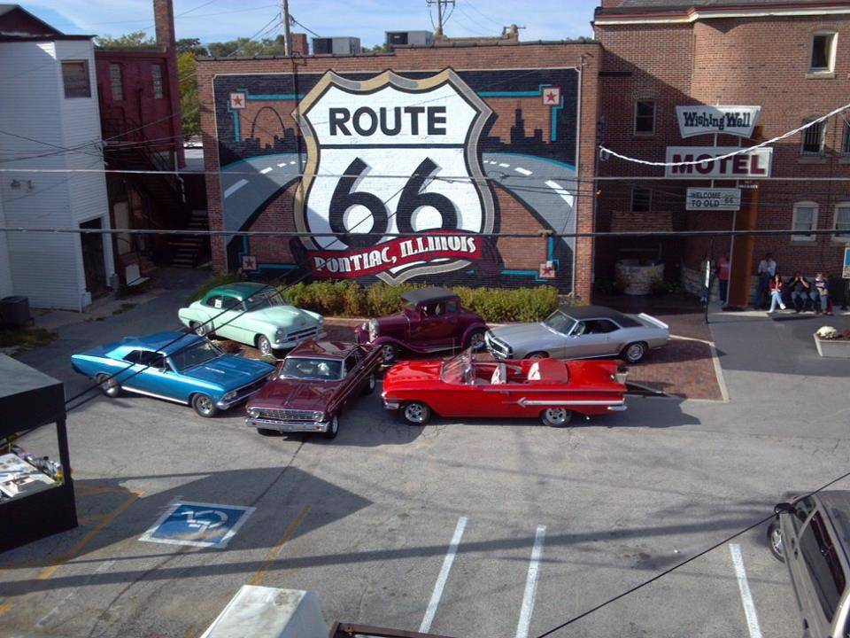 Gentlemen Club cars in front of '66 mural