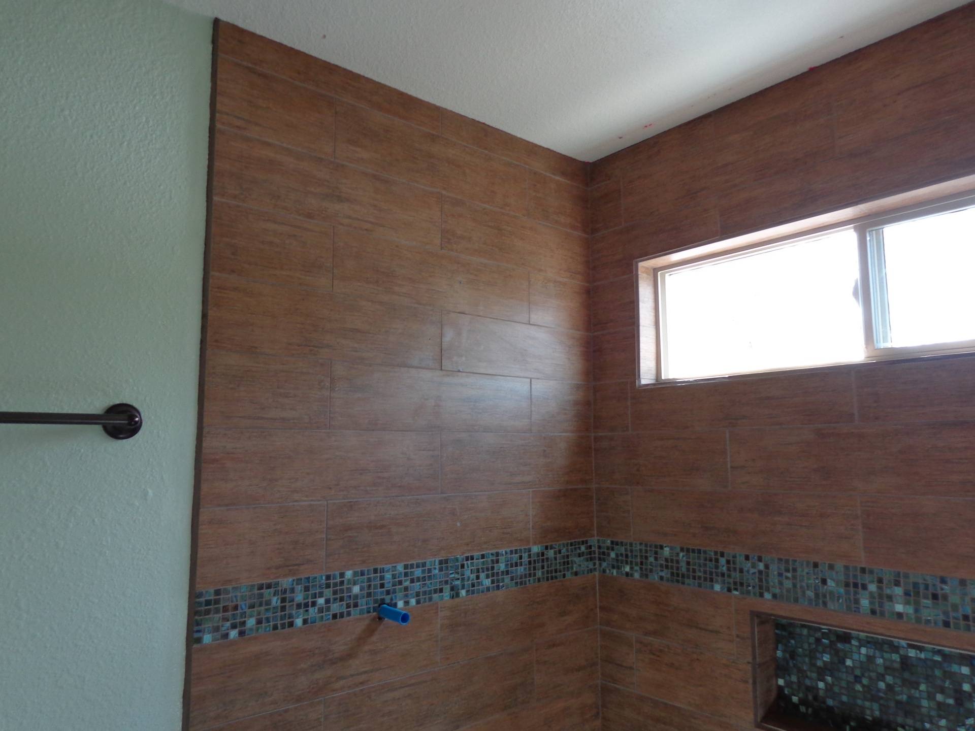Master bathroom tile with deco band